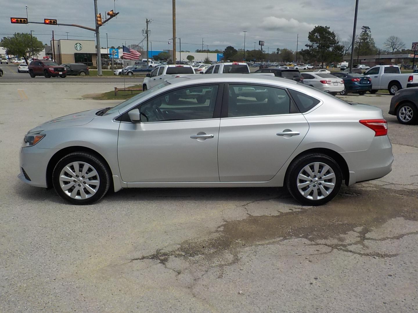 2017 Silver Nissan Sentra S (3N1AB7AP9HY) with an 1.8L L4 SFI DOHC 16V engine, Automatic transmission, located at 1617 W Church Street, Livingston, TX, 77351, (936) 327-3600, 30.710995, -94.951157 - Enjoy the ride without having to worry about what it's costing you! Nice! - Photo#4